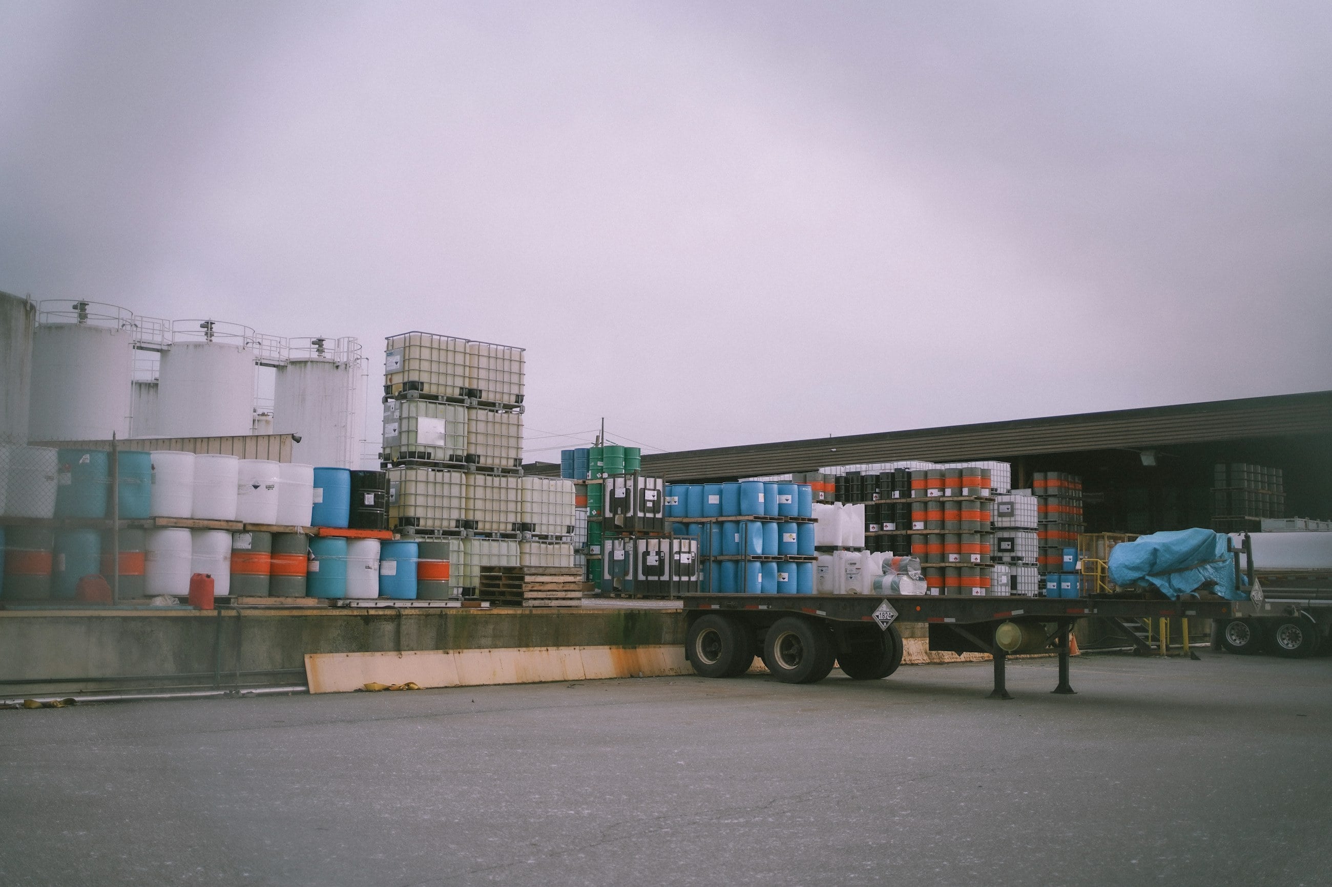 Truck and trailer loaded with freight at a transport depot